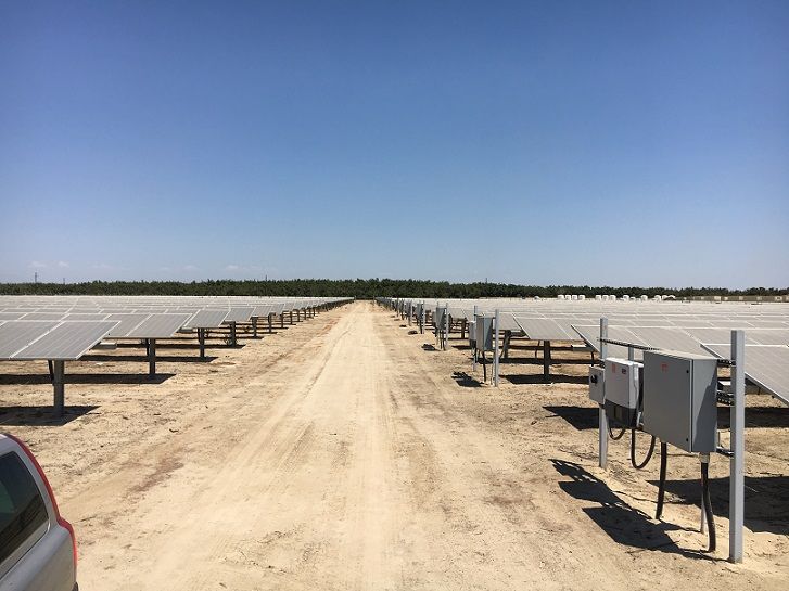 field of block-tracker controlled solar panels